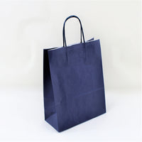 
              Shopper Carta Colorata Maniglia Ritorta
            