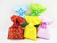 
              Bolsas de regalo de perlas surtidas con tira adhesiva
            