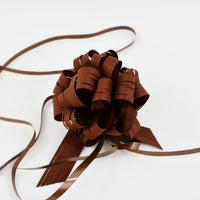 
              Raffia Strip Ribbons
            